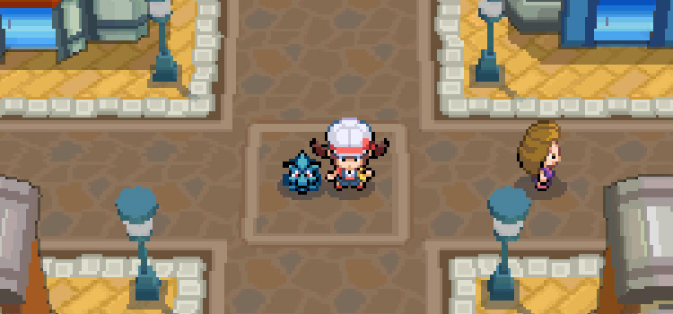 Standing in the center of Goldenrod City with a Pineco (HeartGold)