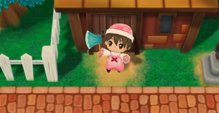 The farmer receives a Mithril Axe from Saibara. / Story of Seasons: Friends of Mineral Town