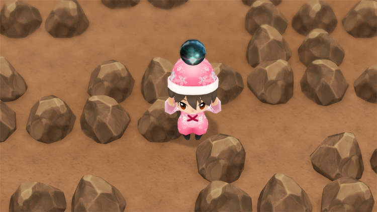 The farmer uncovers Mythic Ore in the Spring Mine. / Story of Seasons: Friends of Mineral Town