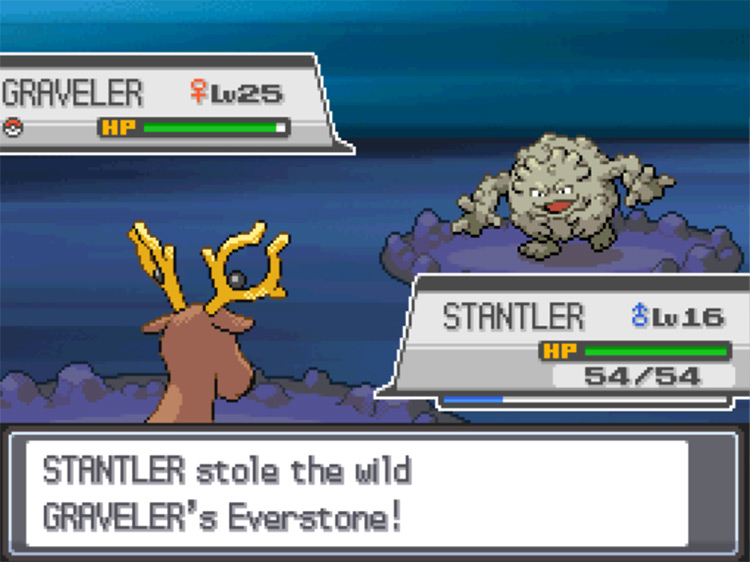A Stantler using the move Thief to steal an Everstone from a Graveler. / Pokémon HeartGold and SoulSilver