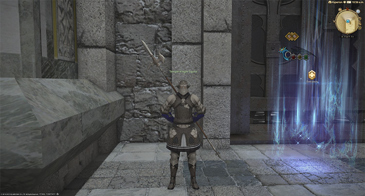 The Temple Knight Squire standing beside The Vault’s entrance / Final Fantasy XIV