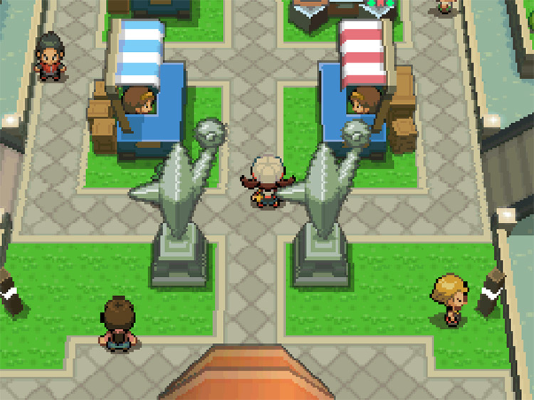 The player entering the Battle Frontier grounds, standing close to a pair of BP exchange stalls / Pokémon HeartGold and SoulSilver